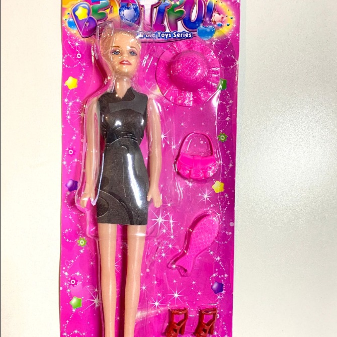 Muñeca c/accesorios de belleza art 09/79/62